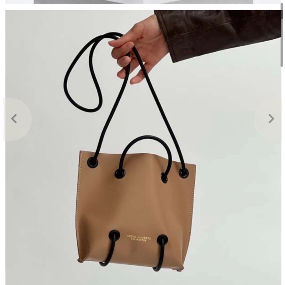 Kozha Numbers nude utility bag